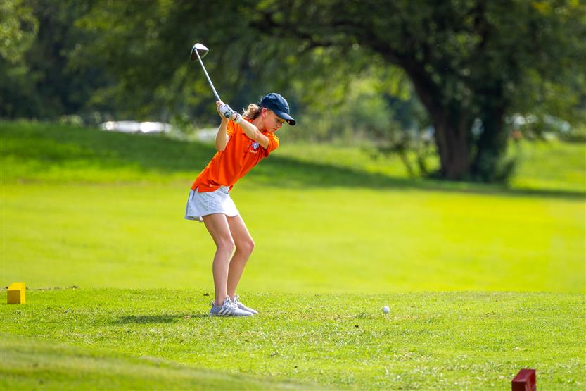 Students play golf